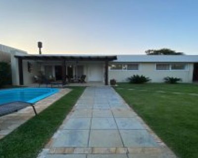 Casa à venda com 226m², 4 dormitórios, 1 suíte, 2 vagas no bairro Atlântida em Xangri-Lá
