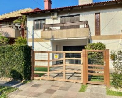 Sobrado à venda com 120m², 4 dormitórios, 1 suíte, 1 vaga no bairro Centro em Xangri-Lá