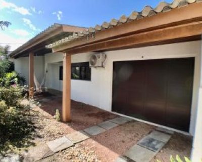 Casa à venda com 175m², 3 dormitórios, 2 vagas no bairro Centro em Xangri-Lá
