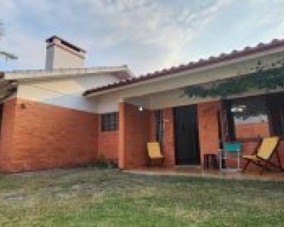 Casa à venda com 132m², 3 dormitórios, 1 suíte, 1 vaga no bairro Centro em Xangri-Lá