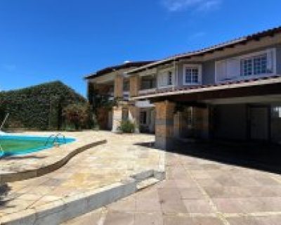 Casa à venda com 158m², 3 dormitórios, 1 suíte, 2 vagas no bairro Atlântida em Xangri-Lá