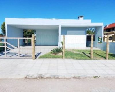 Casa à venda com 170m², 3 dormitórios, 1 suíte, 2 vagas no bairro Centro em Xangri-Lá