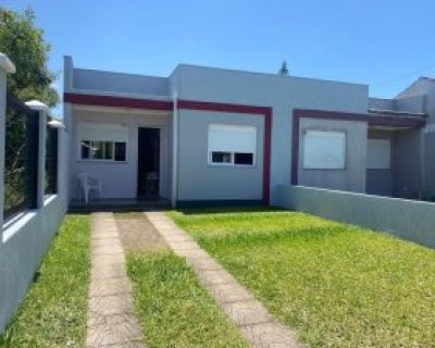Casa à venda com 80m², 2 dormitórios, 1 suíte, 2 vagas no bairro Rainha do Mar em Xangri-Lá
